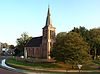 Hervormde kerk in Veendam -  Hervormde kerk in Veendam in de avondzon.