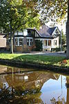 Postkade 2.JPG - Rentenierswoning metaangebouwde schuur in overgangsarchitectuur met chaletstijlen 