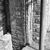 Exterieur detail dichtgemetselde toegang in de zuidgevel van het schip - Baflo - 20027446 - RCE -  N.H.Kerk: exterieur detail dichtgemetselde toegang in de zuidgevel van het schip 