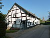 Epen-Kapelaan Houbenstraat 18 (2).JPG -  Kapelaan Houbenstraat 18 in Epen with church in background, Limburg, the Netherlands  Kapelaan Houbenstraat 18 in Epen met kerk op de achtergrond, Limburg, Nederland