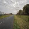 Overzicht op de schuren gelegen aan de overkant van de hoeve