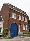Pand, dat deel uitmaakt van schilderachtige huizengroep.
