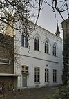Overzicht zijgevel met plint en staafankers - Maastricht - 20335430 - RCE -  Drukkerijmuseum: Overzicht zijgevel met plint en staafankers 