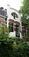 Herenhuis in een door de Art Nouveau beïnvloede eclectische bouwstijl.
