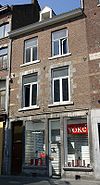 Huis met lijstgevel, waarvan de eerste verdieping in de zgn. Maaslandse renaissance.