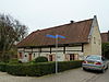 Hoeve in haakvorm van mergel en vakwerk