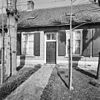 Exterieur hoofdingang boerderij met ramen - Baarle-Nassau - 20322022 - RCE -  Exterieur hoofdingang boerderij met ramen 