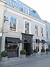 Herenhuis met gepleisterde lijstgevel