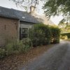 Overzicht zijgevel van boerderij