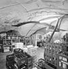 Interieur kelder, gestuct gewelf met schade en aangebrachte leidingen, apparatuur en drankvoorraad - 's-Hertogenbosch - 20340745 - RCE -  Kelder/ Stucwerk: Interieur kelder, gestuct gewelf met schade en aangebrachte leidingen, apparatuur en drankvoorraad 
