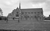 Exterieur overzicht noordgevel van de driebeukige kruiskerk met vieringtoren - Dongen - 20324684 - RCE -  Klooster Franciscanessen: Exterieur overzicht noordgevel van de driebeukige kruiskerk met vieringtoren 