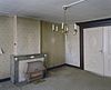 Interieur kamer linksvoor, overzicht met schouw en gaskachel - Terheijden - 20345265 - RCE -  Dubbele woning/ Schouw: Interieur kamer linksvoor, overzicht met schouw en gaskachel 