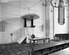 Interieur naar afgesloten koor met preekstoel - Geertruidenberg - 20075819 - RCE -  Nederlands Hervormde Kerk: interieur naar afgesloten koor met preekstoel 