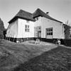 Exterieur gedeelte gevel met deur - Gemert - 20326775 - RCE -  Armenhoeve: Exterieur gedeelte gevel met deur 
