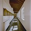 Interieur begane grond, overzicht kloostergang, richting voordeur - Velp - 20351457 - RCE -  Kapucijnenklooster Emmaus: Interieur begane grond, overzicht kloostergang, richting voordeur 