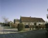 Overzicht van de zuidgevel van de boerderij