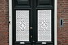 Heusden - Putterstraat 52 - Fraai bewerkte voordeur.JPG