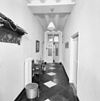 Interieur, begane grond, overzicht gang richting voordeur - Nuenen - 20338029 - RCE -  Voormalige Pastorie / Werkatelier En Woonhuis Geweest Van Vincen: Interieur, begane grond, overzicht gang richting voordeur 