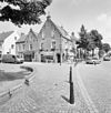 Overzicht winkelpand met straatbeeld - Oirschot - 20328952 - RCE -  Overzicht winkelpand met straatbeeld 