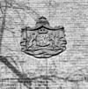 Detail voorgevel kantoorgebouw- gietijzeren plaquette naast de ingang - Oss - 20341239 - RCE -  v.m. Bergoss fabriek: Detail voorgevel kantoorgebouw: gietijzeren plaquette naast de ingang 