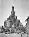 Overzicht zuidwestgevel met vieringtoren - Steenbergen - 20346620 - RCE -  Sint Gummaruskerk: Overzicht zuidwestgevel met vieringtoren (opmerking: Gefotografeerd voor Monumenten In Nederland Noord-Brabant, bladzijde 300) 