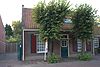 Bokhamerstraat 43 -  Wevershuis onder pannen zadeldak tussen puntgevels 