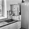 Interieur keuken met granieten aanrechtblad en waterpomp - Veghel - 20326076 - RCE -  Interieur keuken met granieten aanrechtblad en waterpomp 