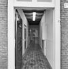Interieur, gang met vloertegels - Sprang - 20342151 - RCE -  Tegelvloer: Interieur, gang met vloertegels 