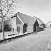 Zijgevel en achterzijde met schuur - Sprang - 20342148 - RCE -  Zijgevel en achterzijde met schuur 