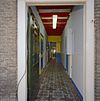 Interieur, gang met vloertegels - Sprang - 20342153 - RCE -  Tegelvloer: Interieur, gang met vloertegels 