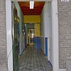 Interieur, gang met vloertegels - Sprang - 20342154 - RCE -  Tegelvloer: Interieur, gang met vloertegels 