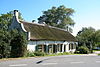 Veerhuis de Zwaan -  Andel - Hoge Maasdijk 51: Deze boerderij is veerhuis De Zwaan, een logement ten tijden van Napoleon