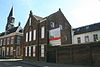 Zundert - Molenstraat 13 - Voormalig Klooster en Internaat -  Klooster en Internaat van de congregatie van Zusters Franciscanessen Penitenten Recollectinen van de Onbevlekte Ontvangenis van Maria te Zundert. Deze werd in 1842 gesticht vanuit het moederklooster te Roosendaal onder de naam St. Anna. Het huidige St. Anna is niet meer in gebruik als klooster. 