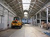 WLM - Minke Wagenaar - 10-06-27 De Hallen Amsterdam 002 - Voormalige tramremise aan het Bellamyplein in Amsterdam Oud-West. Rijksmonument o.a. vanwege de 'Polonceau' spanten. Zeldzaam voorbeeld ervan in Nederland. Antoine-RÃ©my Polonceau (Reims, 1778 - Roche-lez-BeauprÃ©, 1847) was een Franse ingenieur. Hij bouwde de Simplontunnel. Hij is Ã©Ã©n van de 72 Fransen wier namen op de Eiffeltoren gegrift staan. En hij is de uitvinder van dit type spant . . . 