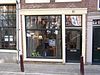 Pand met halsgevel met waaier in de afdekking