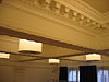 WLM - Minke Wagenaar - 2004 Barlaeus Opening 12 - Gerestaureerd plafond van de aula met nieuwe lampen met geÃ¯ntegreerde luchtbehandeling. Feestelijke opening van het gerestaureerde Barlaeus Gymnasium op 26 november 2004 door burgemeester Cohen. In 1884-1885 tot stand gekomen eerste stedelijk GYMNASIUM met de voorgevel aan de zijde van de Weteringschans en achtergevel aan de Zieseniskade. Vanaf 1927 'Barlaeusgymnasium' genoemd. Gebouwd naar een ontwerp van de architecten W. Springer en J.B. Springer in een gemengde stijl van neo- classicisme e…