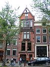 Huis met zeer orginele gevel in middeleeuwse trant maar met neo-renaissance details