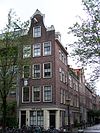 Huis wegens de zandstenen onderdelen van de gekuifde klokvormige top