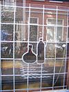 Bloemstraat 42 detail 2 -  Bloemstraat 42, stained-glass window 2 (from left to right)