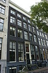 Dubbel huis ontstaan door samentrekking van twee huizen