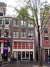 Hoekhuis met ingezwenkte halsgevel