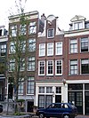 Pand met halsgevel met palmet in de afdekking en een steen waarop ao 1740 t scrikkeliaar (sic