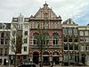 Mijvoordewerkendestand -  De Maatschappij voor den Werkende Stand werd opgericht in 1854 door een aantal bezorgde â€˜werkbazenâ€™. Ze stelden zich als doel de zedelijke en stoffelijke belangen van de werkende stand te bevorderen. Op 13 juni 1883 werd de opening van hun nieuwe gebouw aan de Kloveniersburgwal 87-89 feestelijk gevierd. 