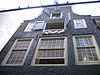WLM - Minke Wagenaar - 09-07-01 Wijnand Fockink 007 - Proeflokaal voor likeur Likeurstokerij achter Krasnapolsky Pijlsteeg 31 Amsterdam Rijksmonument 4746 Pand met klokgevel (1689, afdeklijst XIX) met houten pui en winkelinterieur (XVIII). Wijnand Fockink Pijlsteeg 43 1012 HH Amsterdam 020 6392695 