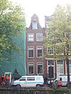 Huis, vanwege de natuurstenen afdekking van de klokvormige top