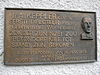 Plaquette Keppler -  Plaquette Arie Keppler op het bibliotheekgebouw, Brink 43, Amsterdam-Oost