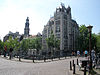 Astoria Amsterdam 3 - The Astoria building (1904/05) at Keizersgracht 174-176 in Amsterdam, at the intersection of the Keizersgracht and Leliegracht canals. This Jugendstil building was designed by Gerrit van Arkel and H.H. Baanders as the offices of the life insurance company Eerste Hollandsche Levensverzekerings Bank. In more recent years, it served as headquarters of Greenpeace. In 2001 the building received rijksmonument (national monument) status. Note the spire of the Westerkerk church on the left. 