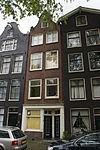 Huis, vanwege de zandstenen afdekkingen van de klokvormige top