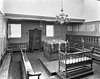 Interieur van de wintersynagoge met biema (= verhoging voor het voorlezen van de Tora), Heilige Arke, kroonluchter en banken - Amsterdam - 20013930 - RCE -  Portugese synagoge: Interieur van de wintersynagoge met biema (= verhoging voor het voorlezen van de Tora), Heilige Arke, kroonluchter en banken 