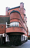Aschool4 -  Amsterdamse School, Spaarndammerplantsoen. Het originele bestand staat hier en wordt hier gebruikt. 